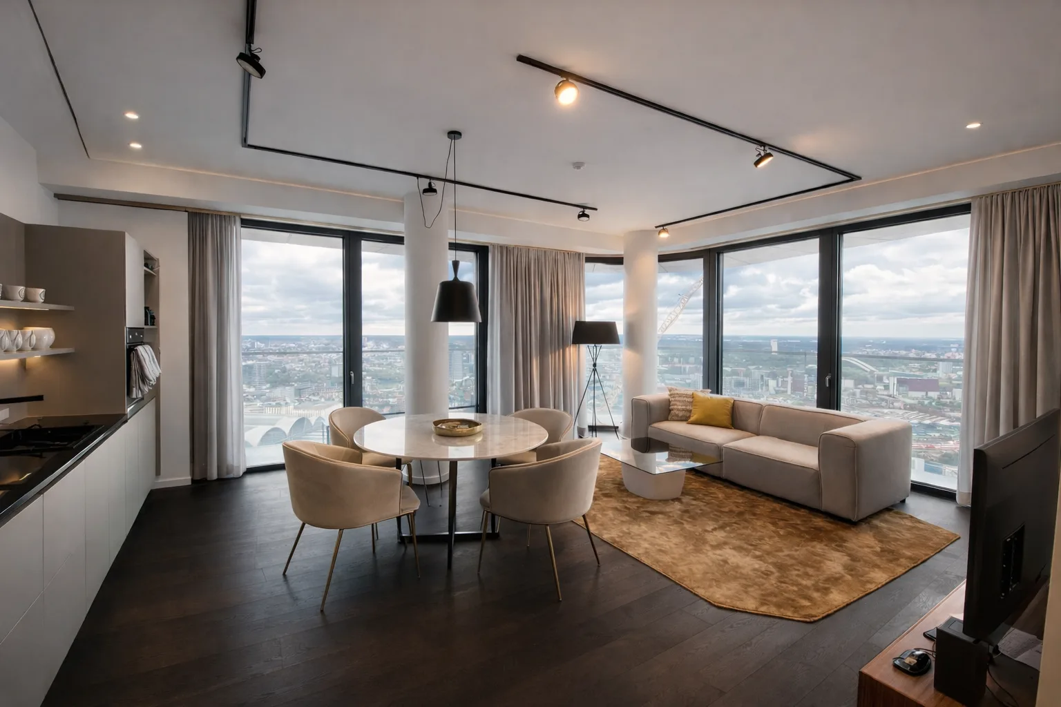 Open-plan dining and living, oak floor, window wall on two sides